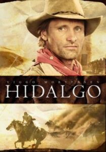 Movie poster for Hidalgo. On the top, a headshot of actor Viggo Mortensen; on the bottom, Viggo and the titular horse ride across the desert