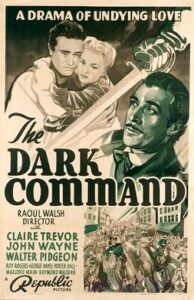 Movie poster for Dark Command. Drawings of actors John Wayne, Claire Trevor and Walter Pidgeon populate the image. 